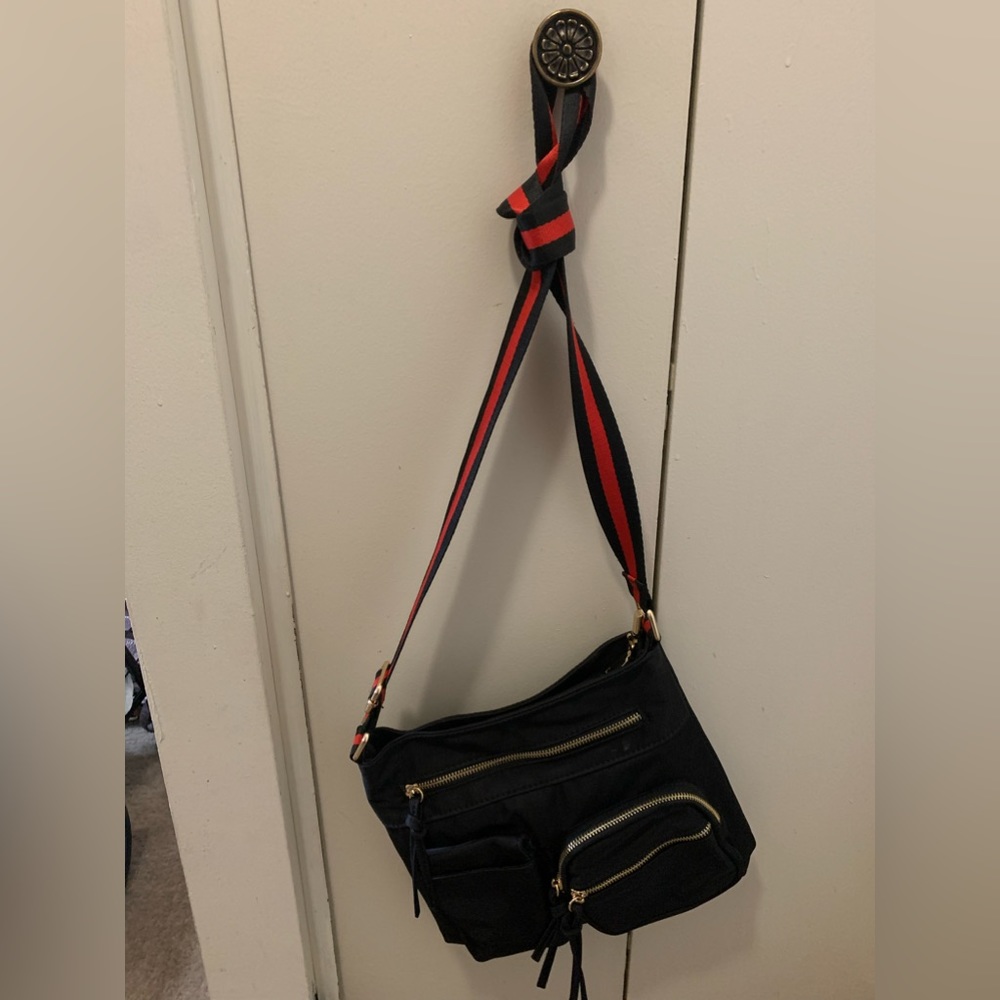 Cute satchel bag with front compartment.